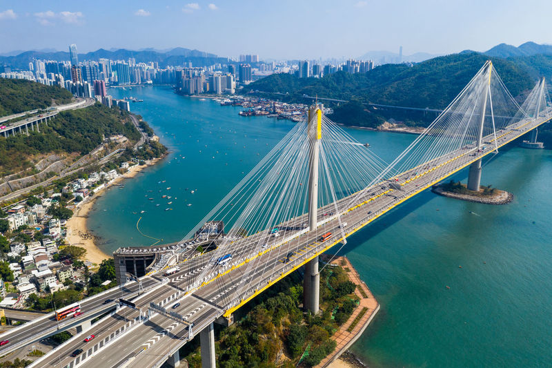 Aerial view of bridge over sea in city