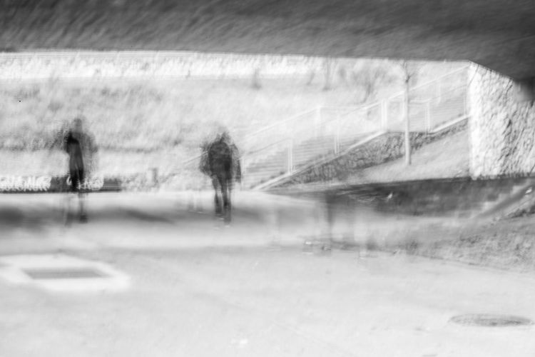 Man standing in wet winter