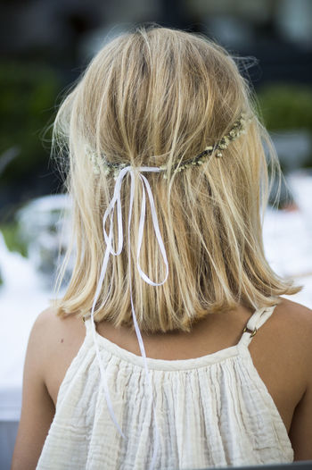 Rear view of girl with blond hair