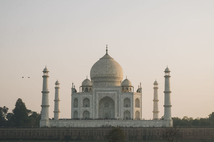 Taj mahal at sunset as seen from mehtab bagh viewpoint, agra