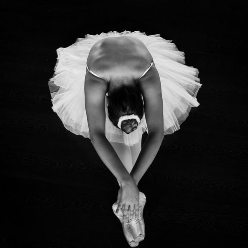 High angle view of ballerina performing at dance studio