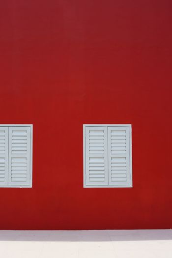 Closed door of red building