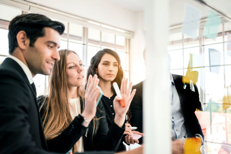 Business colleagues having discussion at office