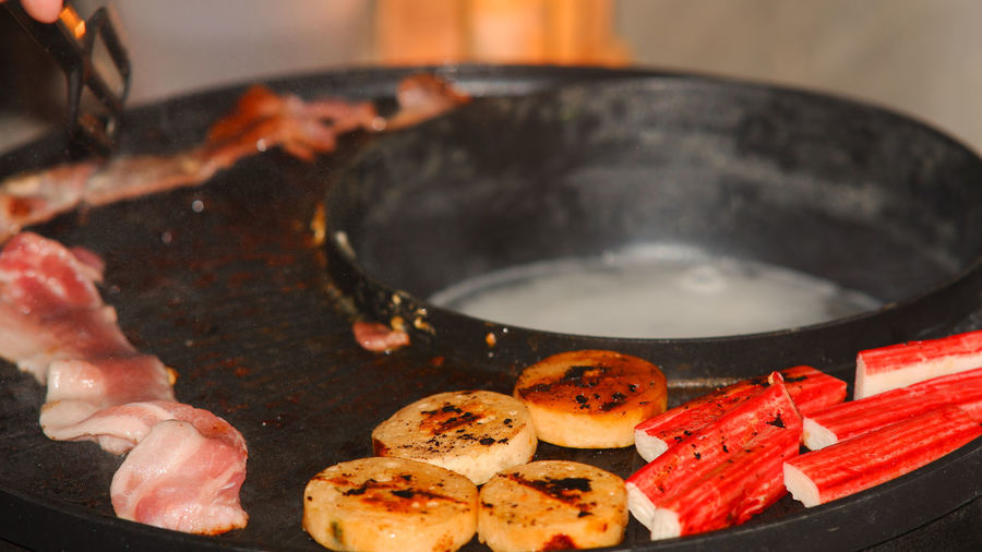 High angle view of meat in cooking pan