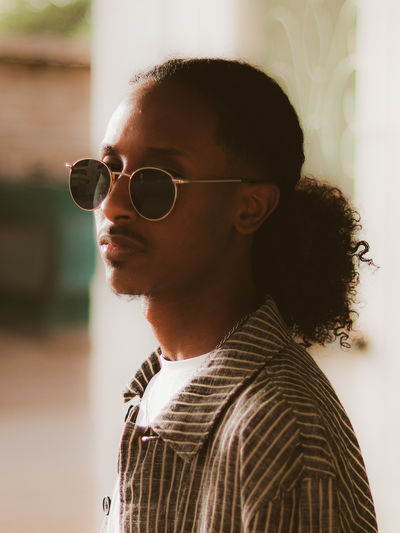 Portrait of young man wearing sunglasses