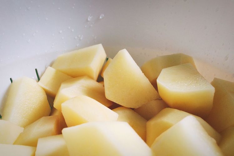 Close-up of chopped potatoes in bowl