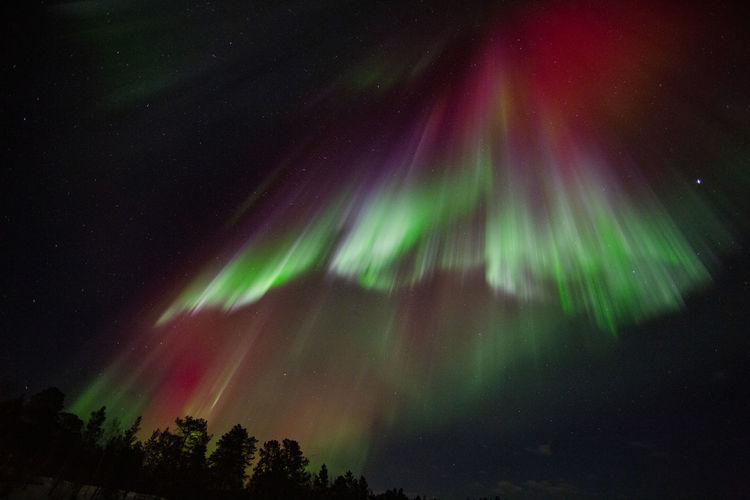 Northern lights / aurora borealis in finland. very intense red colours