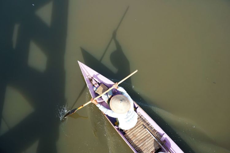 High angle view of man in boat on lake