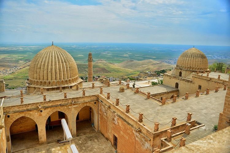 High angle view of dome against cloudy sky