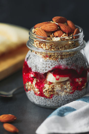 Close-up of dessert in jar on table
