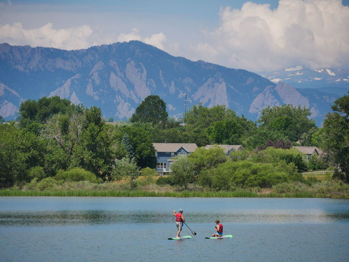 People paddleboarding in waneka lake park