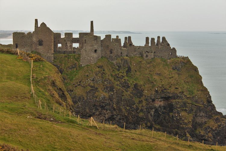 Scenic view of sea and buildings against sky