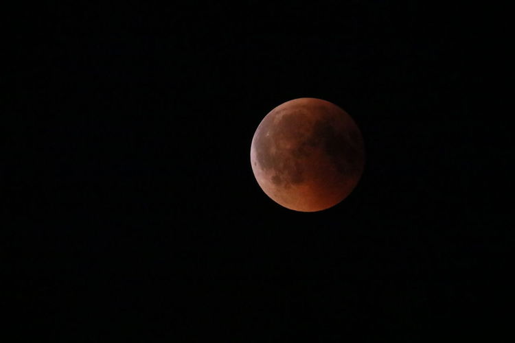 Scenic view of moon against sky at night