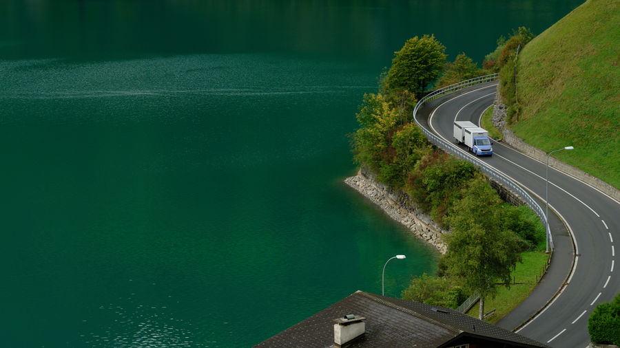 High angle view of road by lake