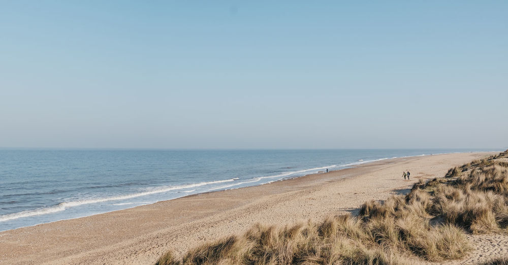 Panoramic view from the hill over hemsby beach, norfolk, uk, on a sunny spring day.
