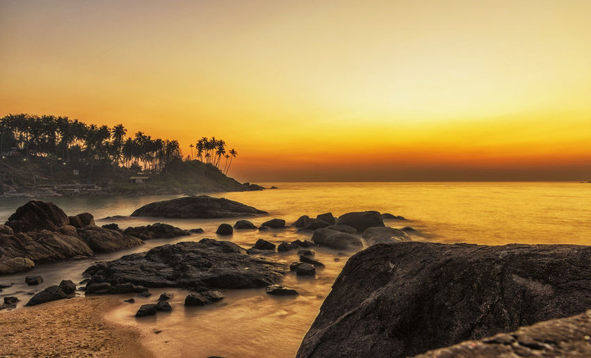 Scenic view of sea against sky during sunset