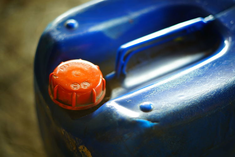 High angle view of blue gallon on land