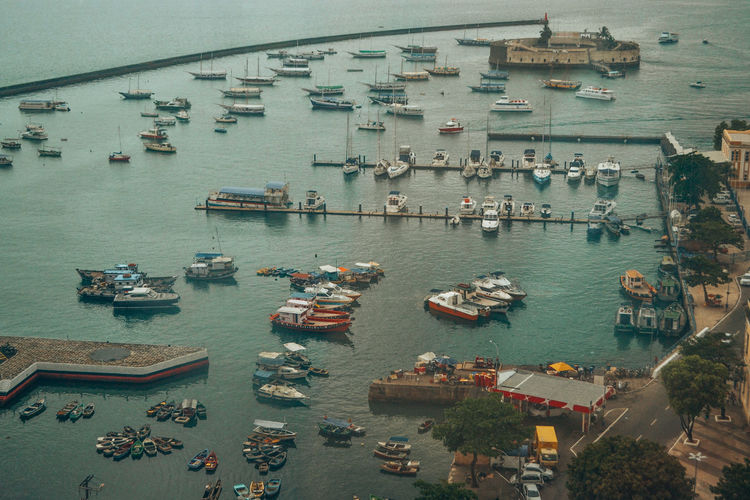 Aerial view of boats sailing at harbor