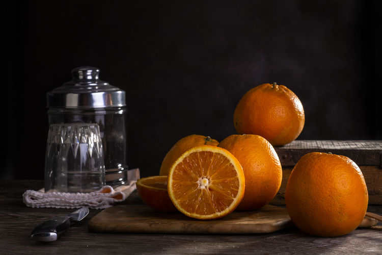 Close-up of oranges on table