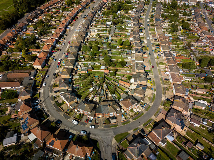 High angle view of street amidst buildings in town