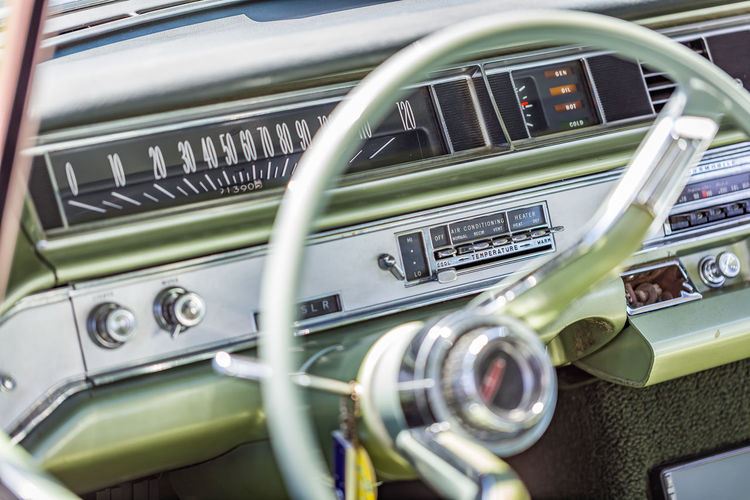 Close-up of steering wheel in vintage car