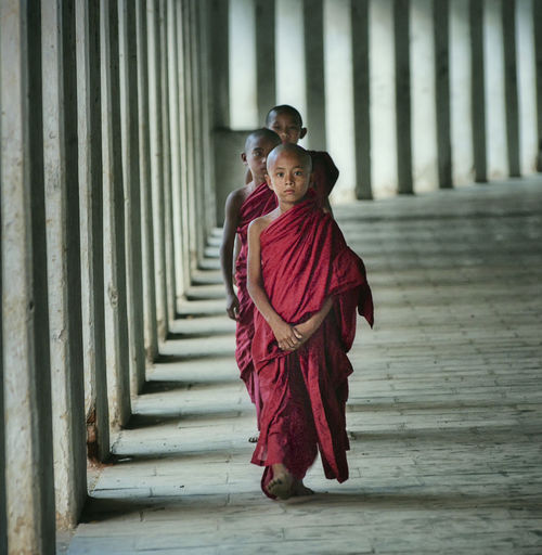 Monks walking in temple