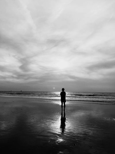 Silhouette of people on beach