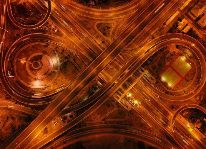 Directly above shot of intertwined highways at night
