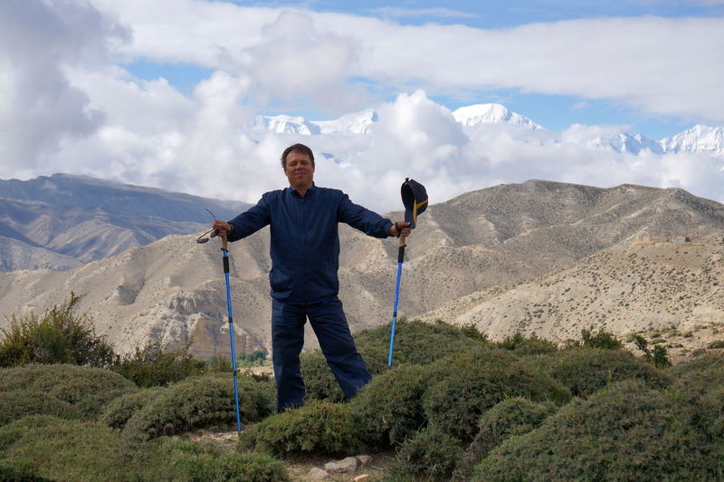 Full length of man standing on mountain