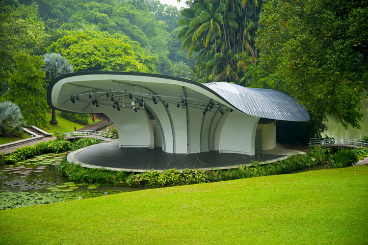 Built structure by trees in park