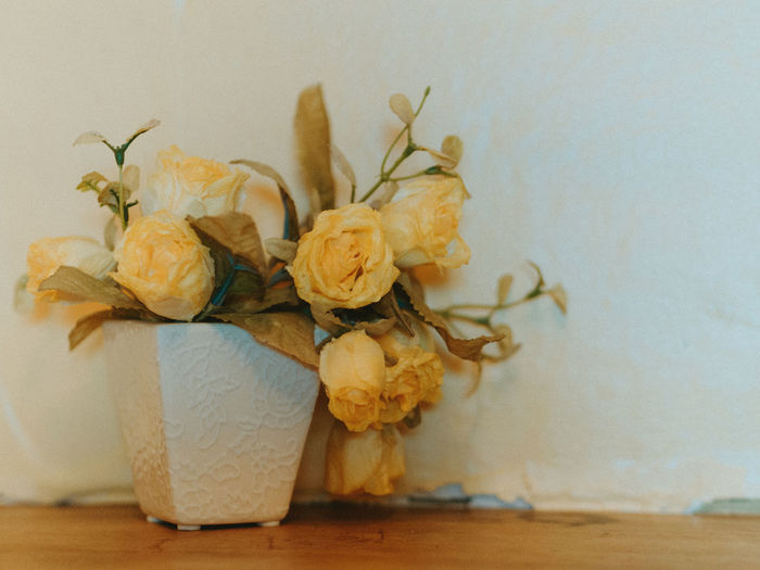 Close-up of rose bouquet on table at home