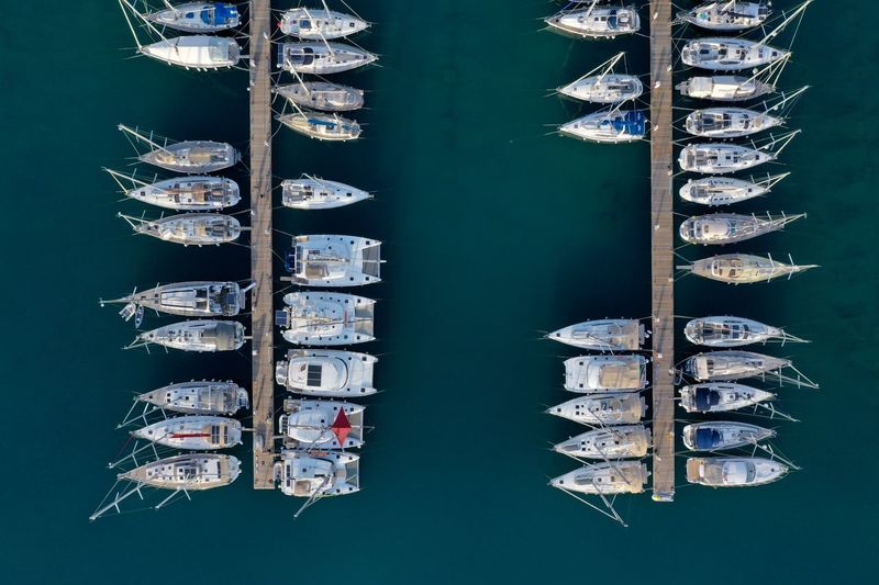 Directly above shot of boats moored in row