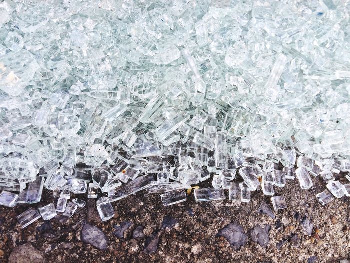 Glass particles on ground
