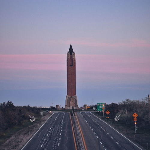 Empty road leading towards water tower at jones beach state park