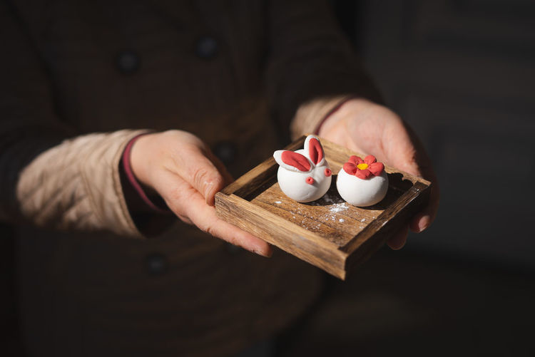 People make sweet dumplings to celebrate the lantern festival in southern china.