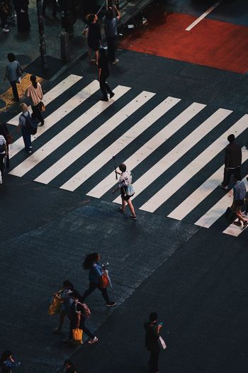 High angle view of people on road