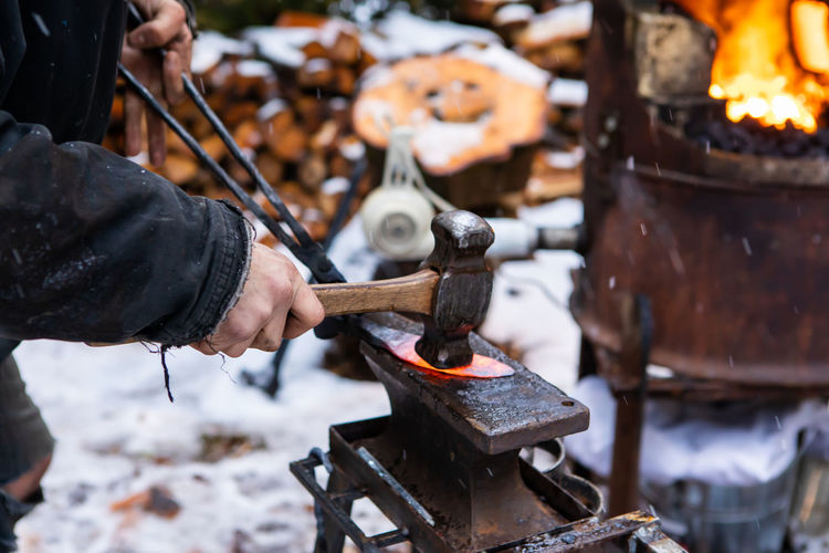 Man working on metal