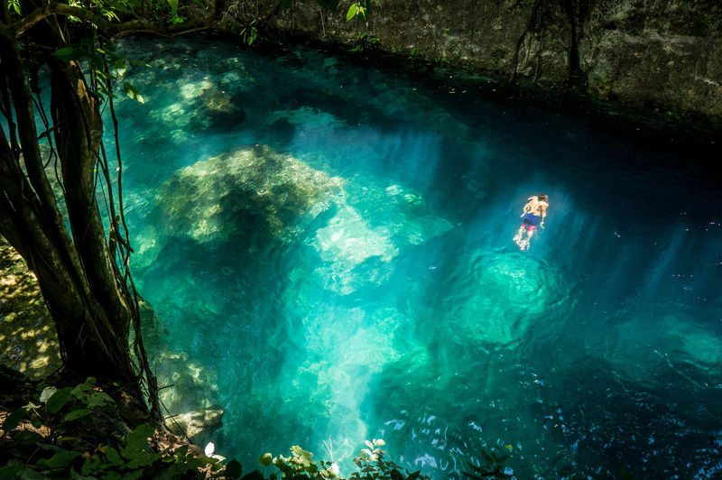 High angle view of man swimming