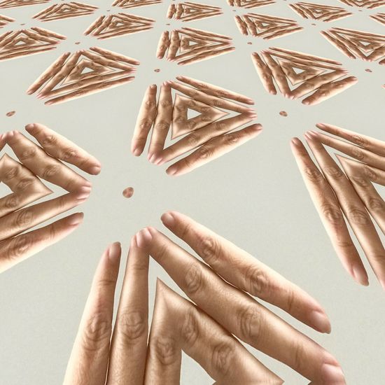 Kaleidoscoping pattern on human hand